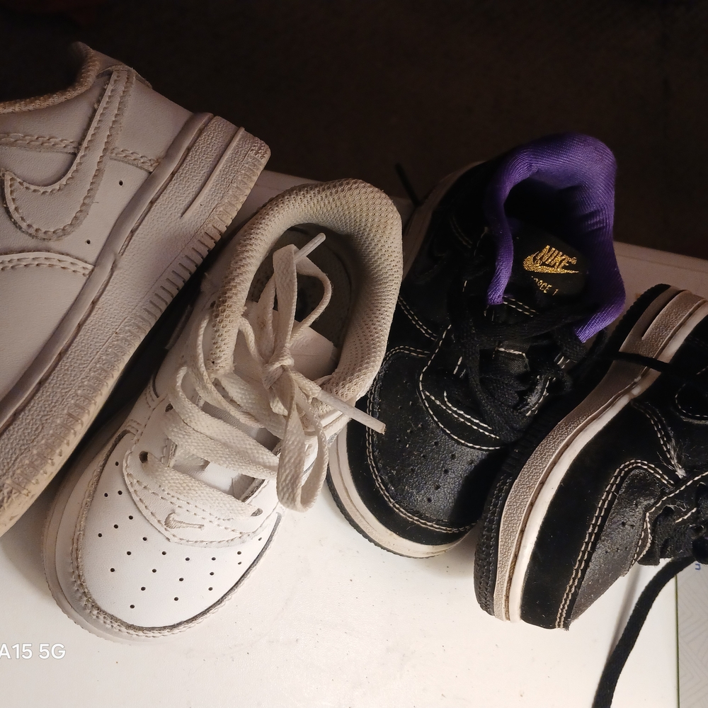 Nike Kids' White and Black Sneakers with Purple Accents